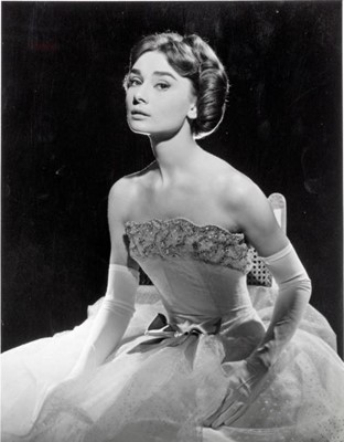 Lot 79 - Audrey Hepburn's Givenchy haute couture white point d'esprit ball gown worn in the opera scene of 'Love in the Afternoon', 1956