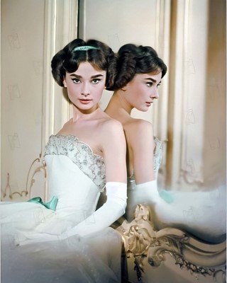 Lot 79 - Audrey Hepburn's Givenchy haute couture white point d'esprit ball gown worn in the opera scene of 'Love in the Afternoon', 1956