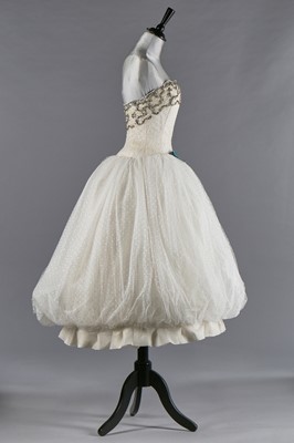 Lot 79 - Audrey Hepburn's Givenchy haute couture white point d'esprit ball gown worn in the opera scene of 'Love in the Afternoon', 1956