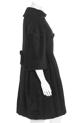 Lot 87 - An American licensed copy of a Balenciaga black wool coat, circa 1960