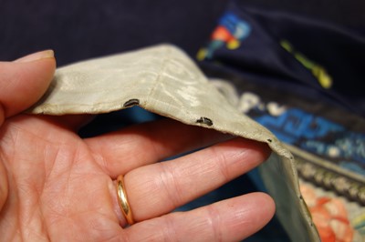 Lot 262 - An embroidered satin informal robe, Changfu, Chinese, circa 1900