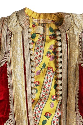 Lot 255 - A finely-embroidered crimson velvet Piri Piri wedding robe, Albanian, Ottoman, late 19th century