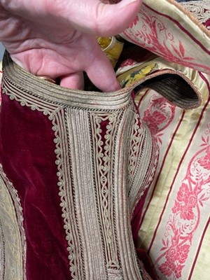 Lot 255 - A finely-embroidered crimson velvet Piri Piri wedding robe, Albanian, Ottoman, late 19th century