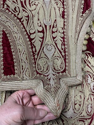 Lot 255 - A finely-embroidered crimson velvet Piri Piri wedding robe, Albanian, Ottoman, late 19th century