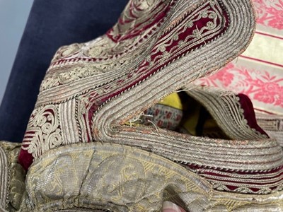 Lot 255 - A finely-embroidered crimson velvet Piri Piri wedding robe, Albanian, Ottoman, late 19th century