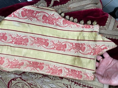 Lot 255 - A finely-embroidered crimson velvet Piri Piri wedding robe, Albanian, Ottoman, late 19th century