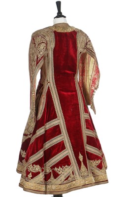 Lot 255 - A finely-embroidered crimson velvet Piri Piri wedding robe, Albanian, Ottoman, late 19th century