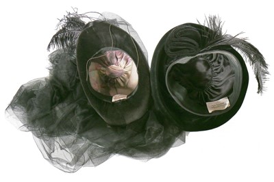 Lot 235 - A Vivienne Westwood black velvet hat with tulle veil to rear, circa 2008