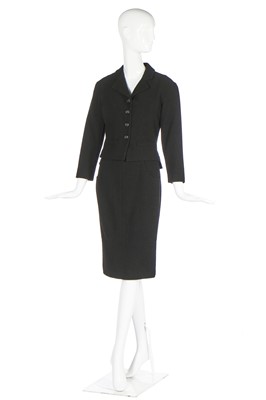 Lot 151 - A Chanel black wool-blend suit, late 1990s