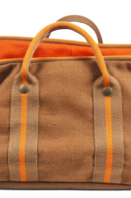 Lot 132 - An Hermès canvas cushioned dog bed, modern