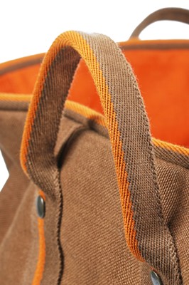 Lot 132 - An Hermès canvas cushioned dog bed, modern