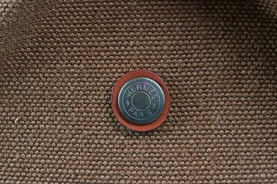 Lot 132 - An Hermès canvas cushioned dog bed, modern