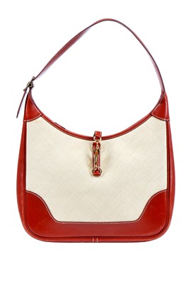 Lot 125 - An Hermès straw and brick-red-brown leather Trim bag, probably 1990s