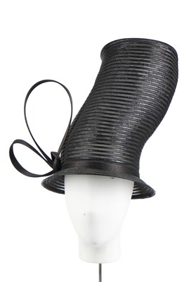 Lot 145 - A Philip Treacy black raffia ribbed mesh top hat, modern