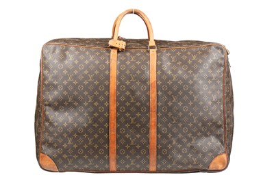 Lot 5 - A Louis Vuitton monogrammed canvas and leather suitcase, large