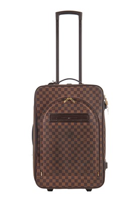 Lot 118 - A Louis Vuitton Pégase Damier Ebène canvas and leather suitcase