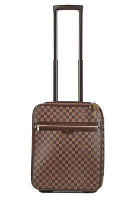Lot 119 - A Louis Vuitton Pégase Damier Ebène canvas and leather suitcase, small