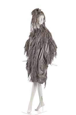 Lot 339 - An Issey Miyake fringed coat and hat, Autumn-Winter, 1985-86