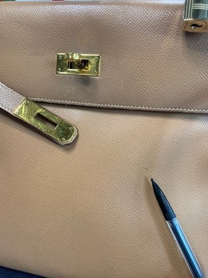 Lot 67 - An Hermès cognac graine calf leather Kelly 35, 1993