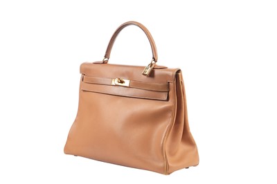 Lot 67 - An Hermès cognac graine calf leather Kelly 35, 1993