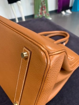 Lot 70 - An Hermès golden-brown clemence leather Birkin 35, 2001
