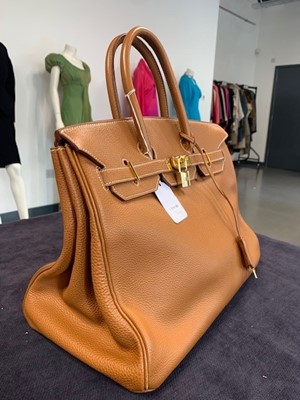 Lot 70 - An Hermès golden-brown clemence leather Birkin 35, 2001