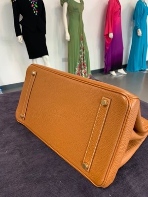 Lot 70 - An Hermès golden-brown clemence leather Birkin 35, 2001
