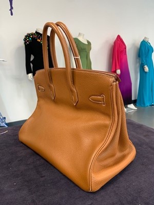 Lot 70 - An Hermès golden-brown clemence leather Birkin 35, 2001