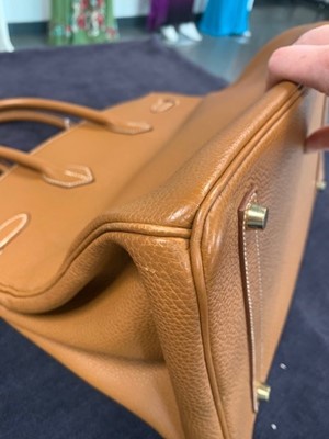 Lot 70 - An Hermès golden-brown clemence leather Birkin 35, 2001