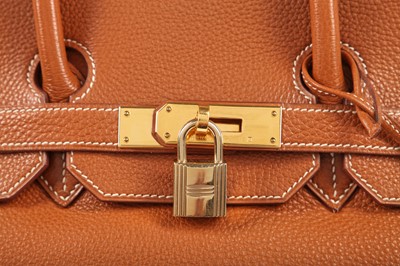 Lot 70 - An Hermès golden-brown clemence leather Birkin 35, 2001