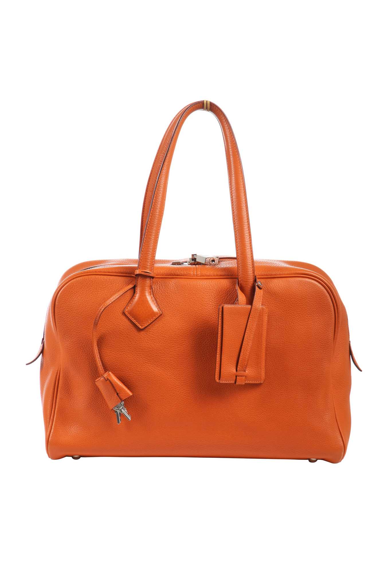 Lot 72 - An Hermès orange clemence leather Victoria II 35, 2007