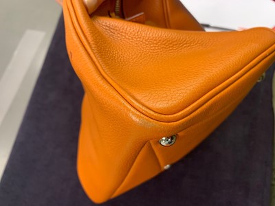 Lot 72 - An Hermès orange clemence leather Victoria II 35, 2007