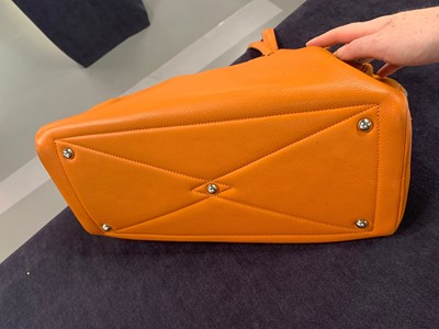 Lot 72 - An Hermès orange clemence leather Victoria II 35, 2007