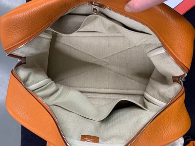Lot 72 - An Hermès orange clemence leather Victoria II 35, 2007
