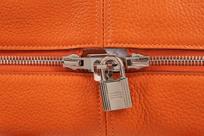 Lot 72 - An Hermès orange clemence leather Victoria II 35, 2007