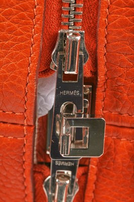 Lot 72 - An Hermès orange clemence leather Victoria II 35, 2007
