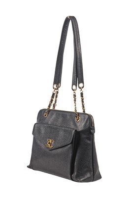 Lot 8 - A Chanel black caviar leather handbag with envelope pocket to front, 1990s