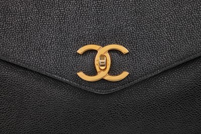 Lot 8 - A Chanel black caviar leather handbag with envelope pocket to front, 1990s