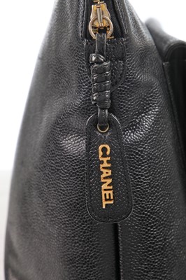Lot 8 - A Chanel black caviar leather handbag with envelope pocket to front, 1990s