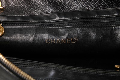 Lot 8 - A Chanel black caviar leather handbag with envelope pocket to front, 1990s
