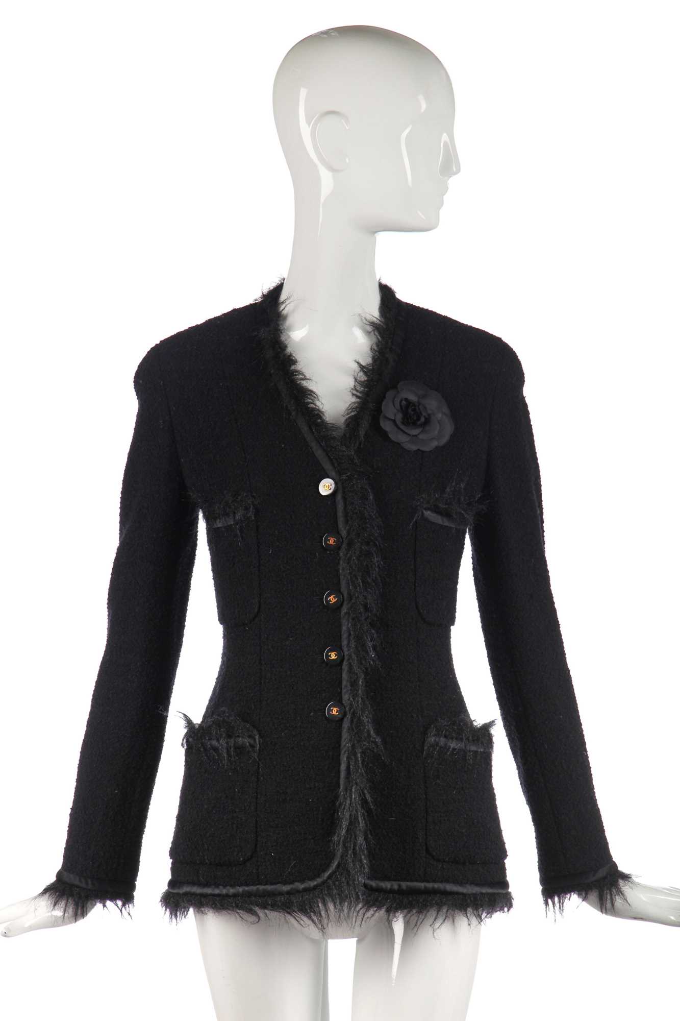 Lot 27 - A Chanel black bouclé wool single-breasted jacket, 1990s