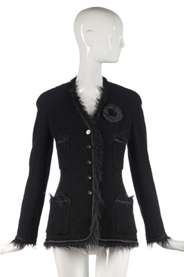 Lot 27 - A Chanel black bouclé wool single-breasted jacket, 1990s