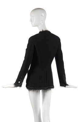 Lot 27 - A Chanel black bouclé wool single-breasted jacket, 1990s