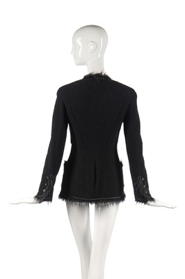 Lot 27 - A Chanel black bouclé wool single-breasted jacket, 1990s