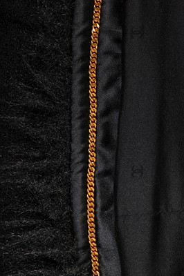 Lot 27 - A Chanel black bouclé wool single-breasted jacket, 1990s