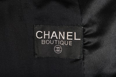 Lot 27 - A Chanel black bouclé wool single-breasted jacket, 1990s