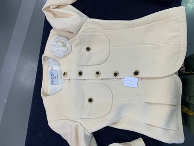 Lot 24 - A Chanel ivory bouclé wool jacket, 1990s