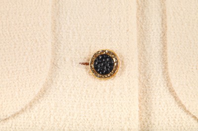 Lot 24 - A Chanel ivory bouclé wool jacket, 1990s