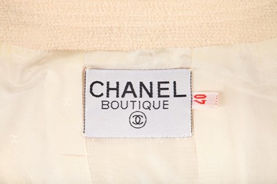 Lot 24 - A Chanel ivory bouclé wool jacket, 1990s