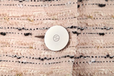Lot 25 - A Chanel dusky-pink wool-blend suit, circa 1999